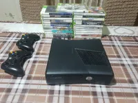 Brand new Xbox 360 slime with two controllers and with the box 500g