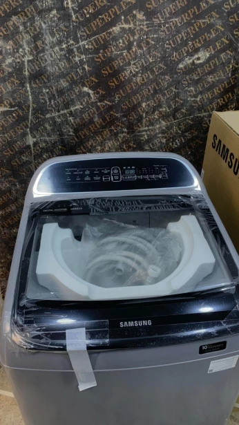 Remise . Machine a laver samsung top loader 13kg 