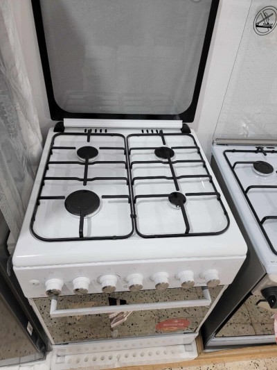 PROMO Cuisinière 4feux Géant punto Blnac ventilé/ Catalysé/ plateau/ 37000Da 