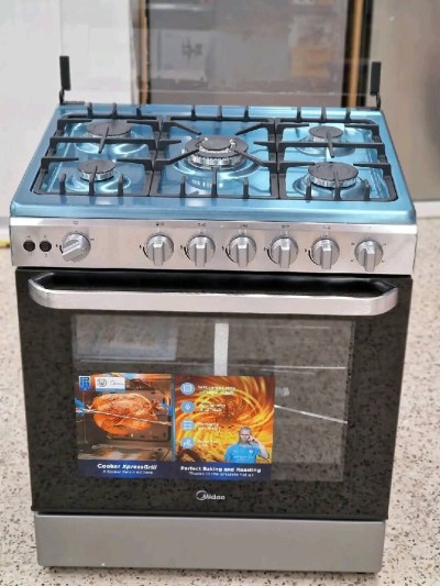 Cuisinière midea 5 feux inox ventilé 