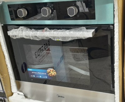 Promo four Encastrable midea inox  70L ventilé catalyseur tourne-broche Gaz Gaz