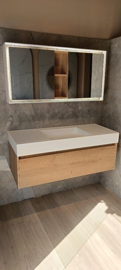 Meuble de salle de bain 110 cm avec vasque incliné en corian blanc 