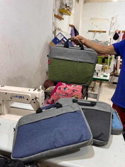 Atelier confection cartable séminaire congés formation avec sérigraphie personnalisé 