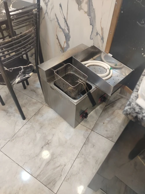 Friteuse comaf à gaz double bac