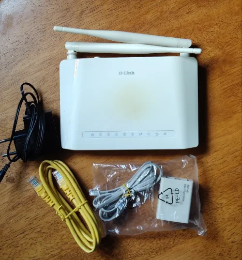 مودم WiFi  مستعمل من قبل D-Link DSL-2750U Wireless N300 ADSL2+ Modem Router