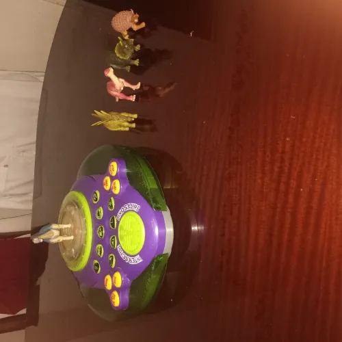 Un jouet "Interactive Dinosaurs Electronic Quiz Toy"