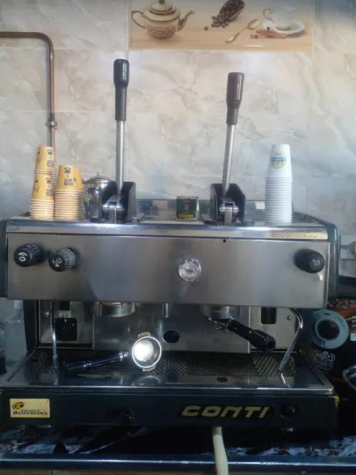 Appareil de café à deux bras