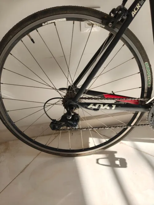 Vélo de route cyclotourisme Btwin triban 520