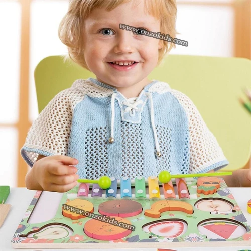 Planche à découper des fruits pour enfant avec piano