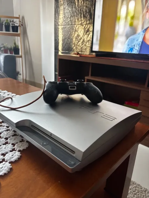 PlayStation 3 + manette + 16 jeux originaux