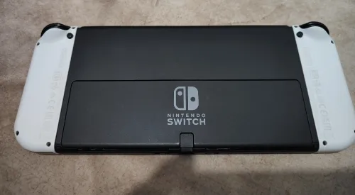 Nintendo switch oled flashée 128 go excellent état