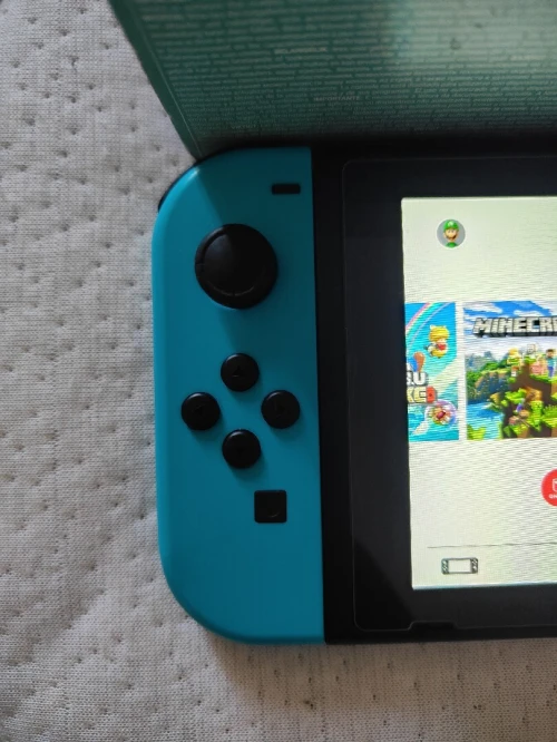 Nintendo switch V2 2023 flashée puce 128 go excellent état + mode online