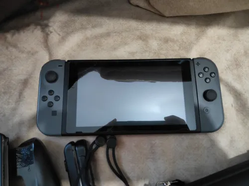 Nintendo switch V2 2020 flashée puce 128 go excellent état