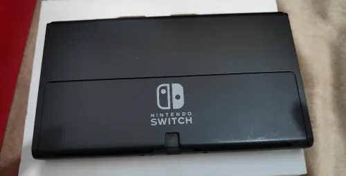 Nintendo switch oled flashée 128 go en excellent état
