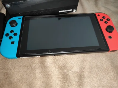 Nintendo switch V2 2021 flashée puce 128 go excellent état + mode online