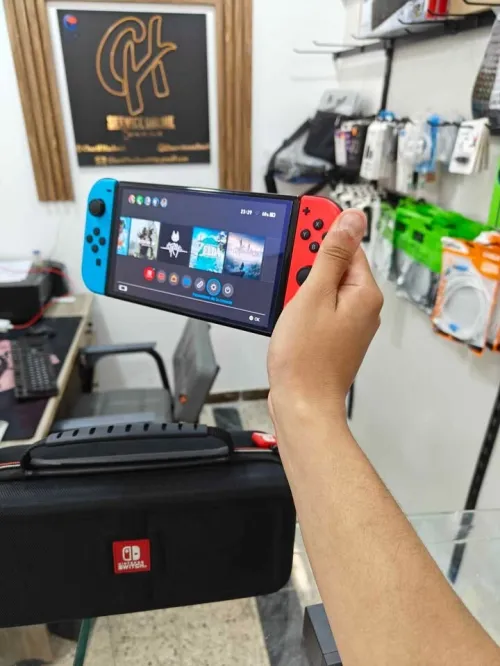 Nintendo Switch OLED tout neuf flaché 128g Plain de jeux avec toute les accessoires 