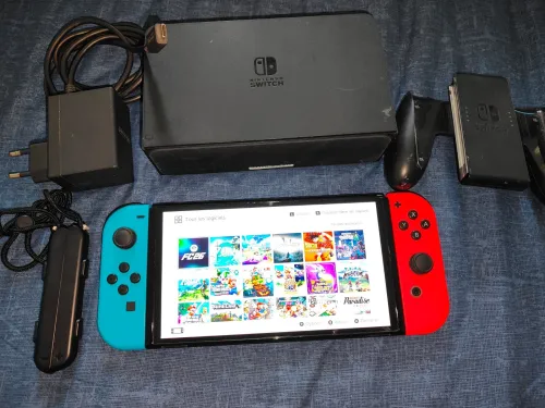 Nintendo switch oled flashée 128 go très bon état