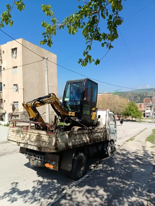 للكراء Location de Mini Pelle avec déplacement dans 58 wilayas