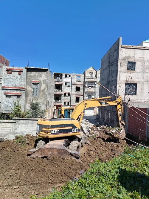Location Pelle pneumatique Caterpillar M312 للكراء