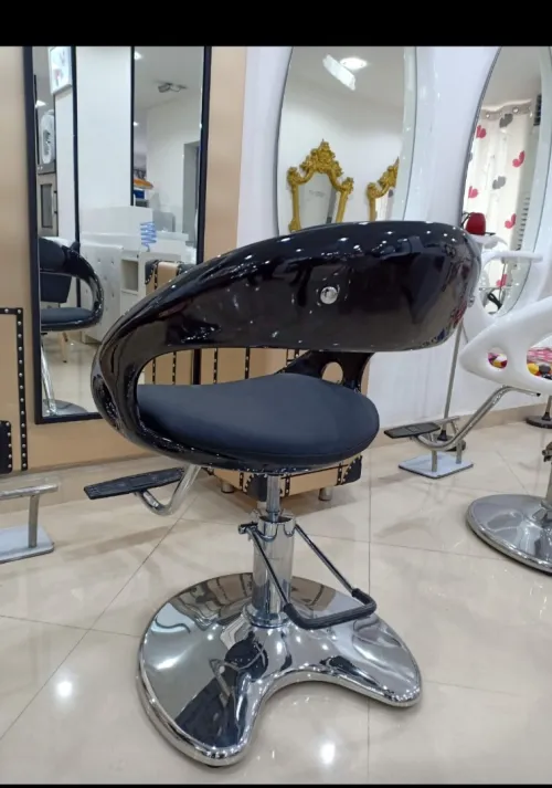 Fauteuil a pompe coiffure femme 