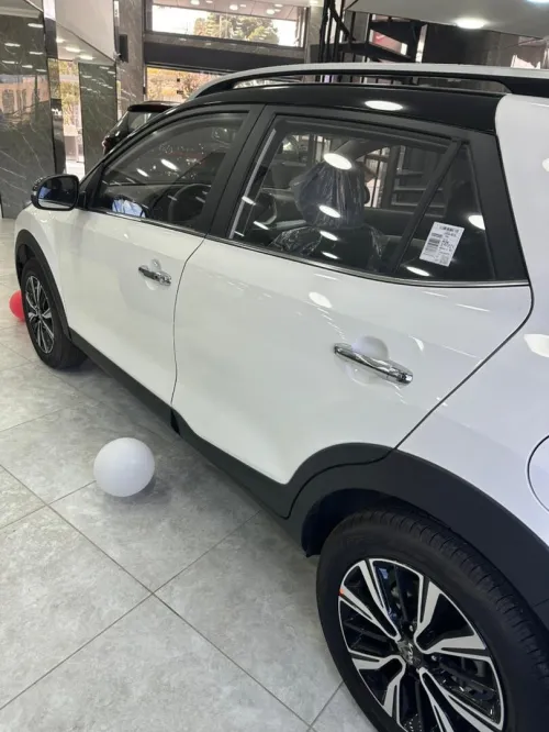 Kia KX1 2025 toutes avec tois noire