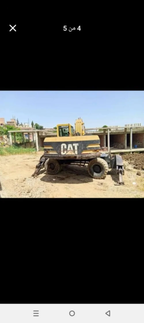 Hyundai Caterpillar M320 pneumatique 