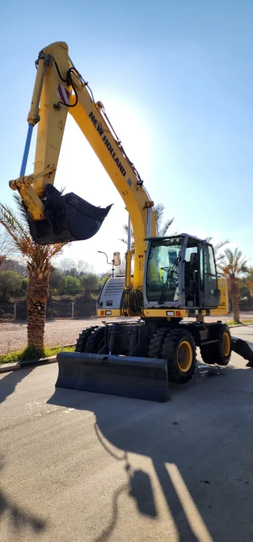 New Hollande Mh plus 18 ton pelle pneumatique 2017