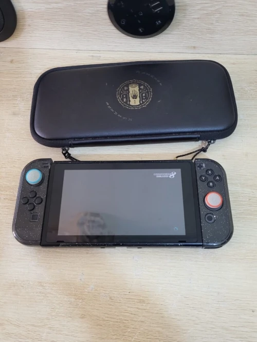 Nintendo Switch + 1 JEUX + PROTECTION TRANSPARENTE + POCHETTE