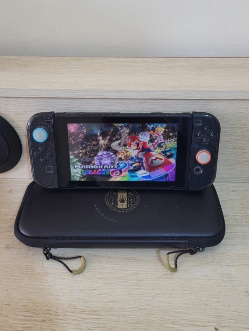 Nintendo Switch + 1 JEUX + PROTECTION TRANSPARENTE + POCHETTE