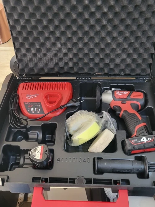 Milwaukee M12 BPS-421X - Set ponceuse polisseuse Li-Ion 12V (1x batterie 4.0Ah & 1x 2.0Ah) dans HD Box - NEUF JAMAIS UTILISÉ.