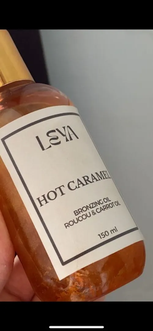 Huile bronzante à l'huile de carotte et roucou parfum vanille caramel | HOT CARAMEL