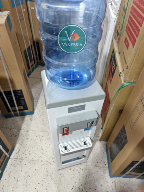 فريجيدار.    Fontaine Marque Midea Avec La Bouteille D'Eau|موزع مياه من ماركة ميديا مع زجاجة مياه Fontaine marque midea couleur blanche