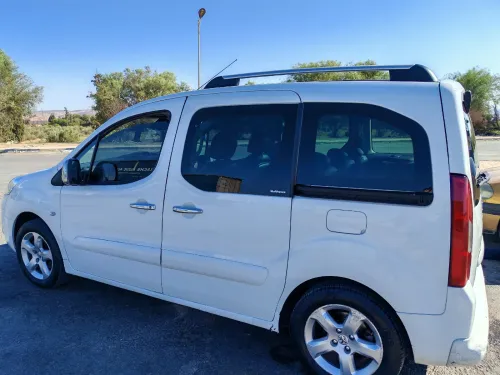 Peugeot Partener tepee 2012 Rakor sghir fel bab mor chofeur+ 30 cm rakor fel mala foga
