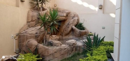 ديكورات و نافورات و شلالات {نافورة-شلال}