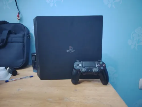 جهاز ps4 pro و ملحقاته
