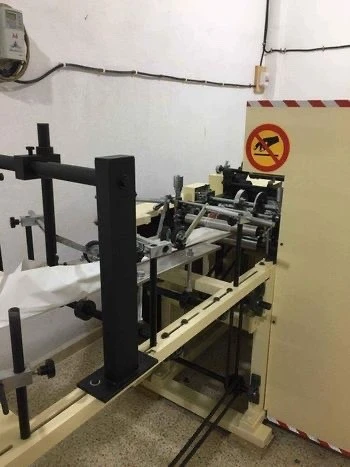 Machine de fabrication des sachets en papier