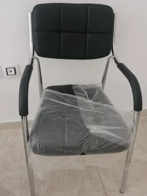 Chaise visiteur en simili cuir