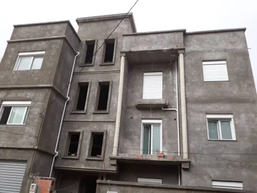 Facade monocouche تهيئة و طلاء الواجهات الخارجية 