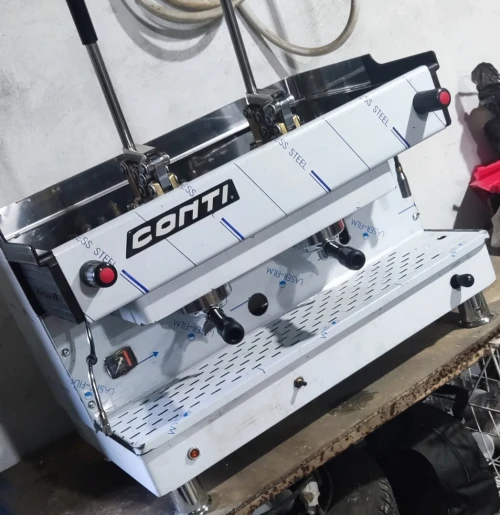 machine à café contiآلة قهوة