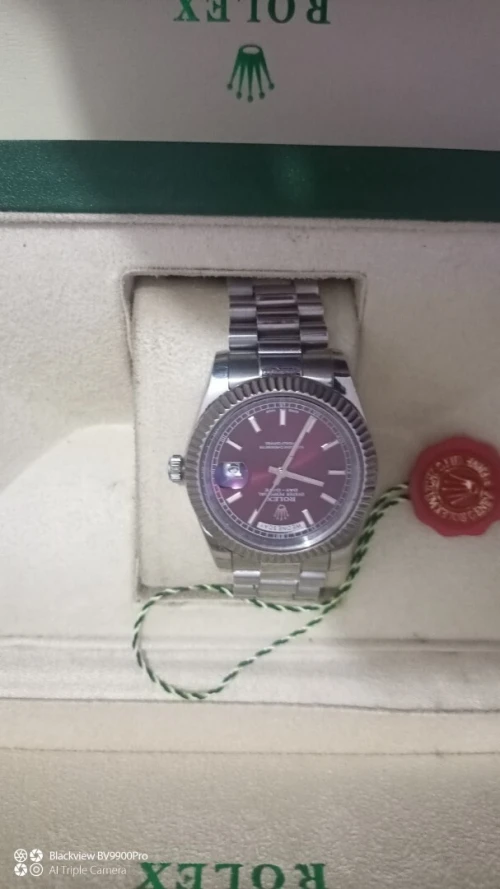 montre Rolex day date good.