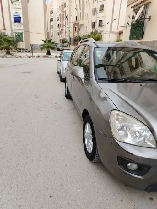 Kia Carens 2010 3 box