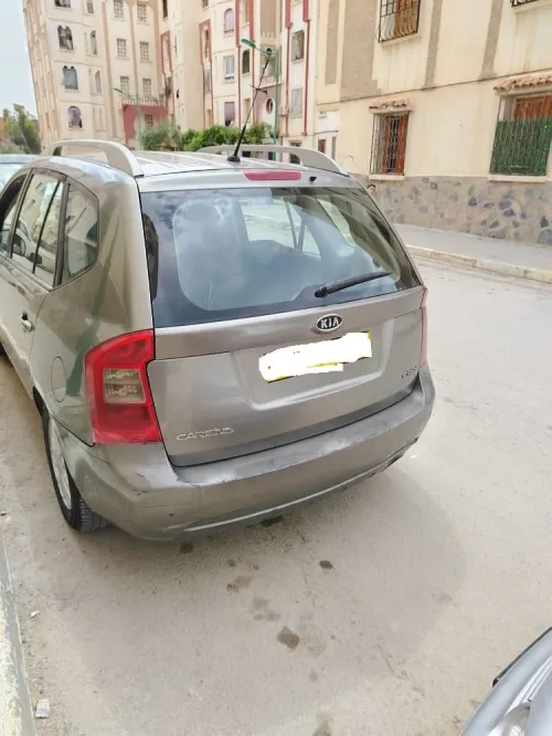Kia Carens 2010 3 box