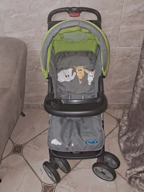 A vendre: Poussette Pingouin en très bon état.