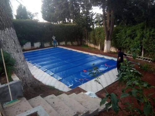 Couverture piscine (Bâche avec barres en Aluminium ) غطاء المسبح (غطاء مزوّد بقضبان من الألمنيوم)