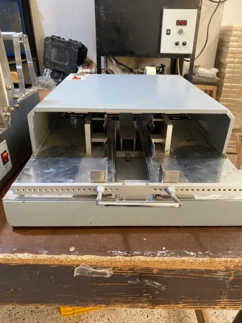 Machine cellophaneuse en X 