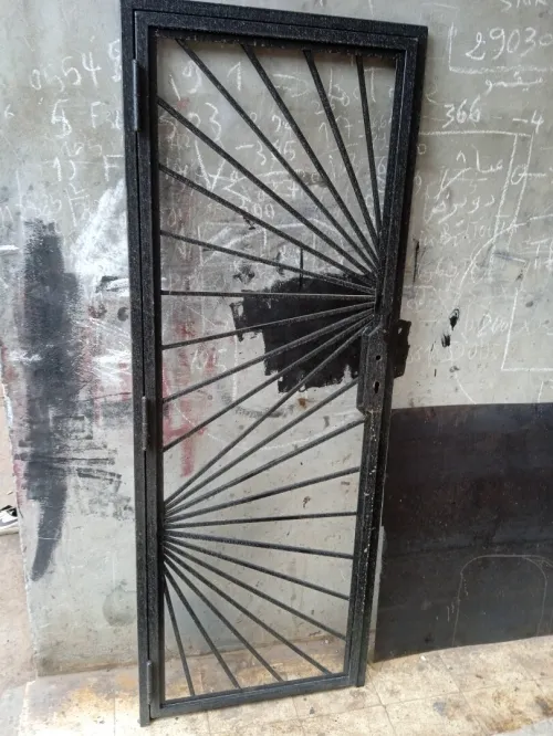 Barroudage et porte en fer forgé 