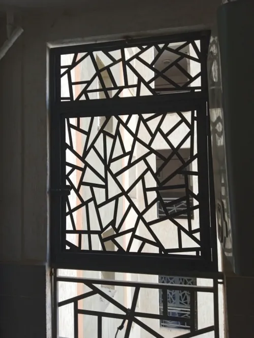 Barroudage et porte en fer forgé 