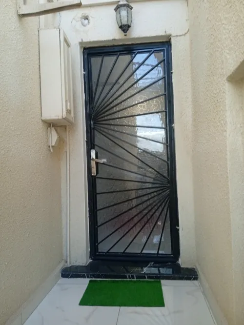 Barroudage et porte en fer forgé 