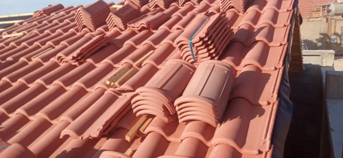 Travaux de tuile et charpente