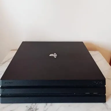 PS4 pro 1To d'occasion+ 3 jeux offerts ! 